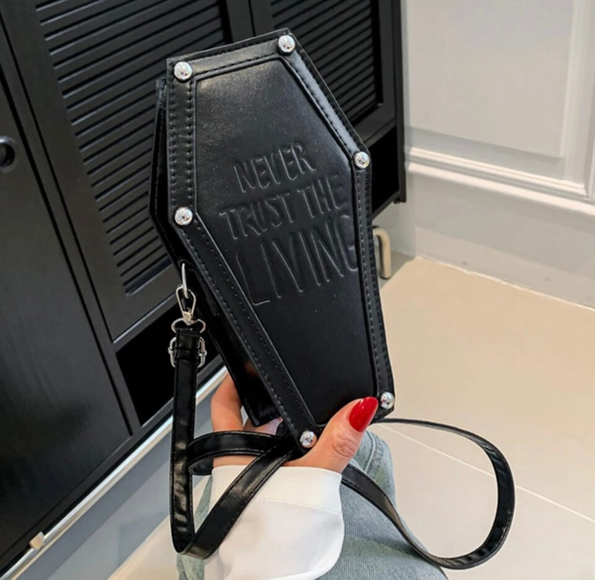 Never trust the living coffin purse