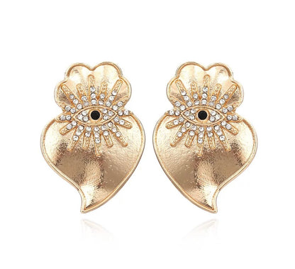 Golden evil eye earrings