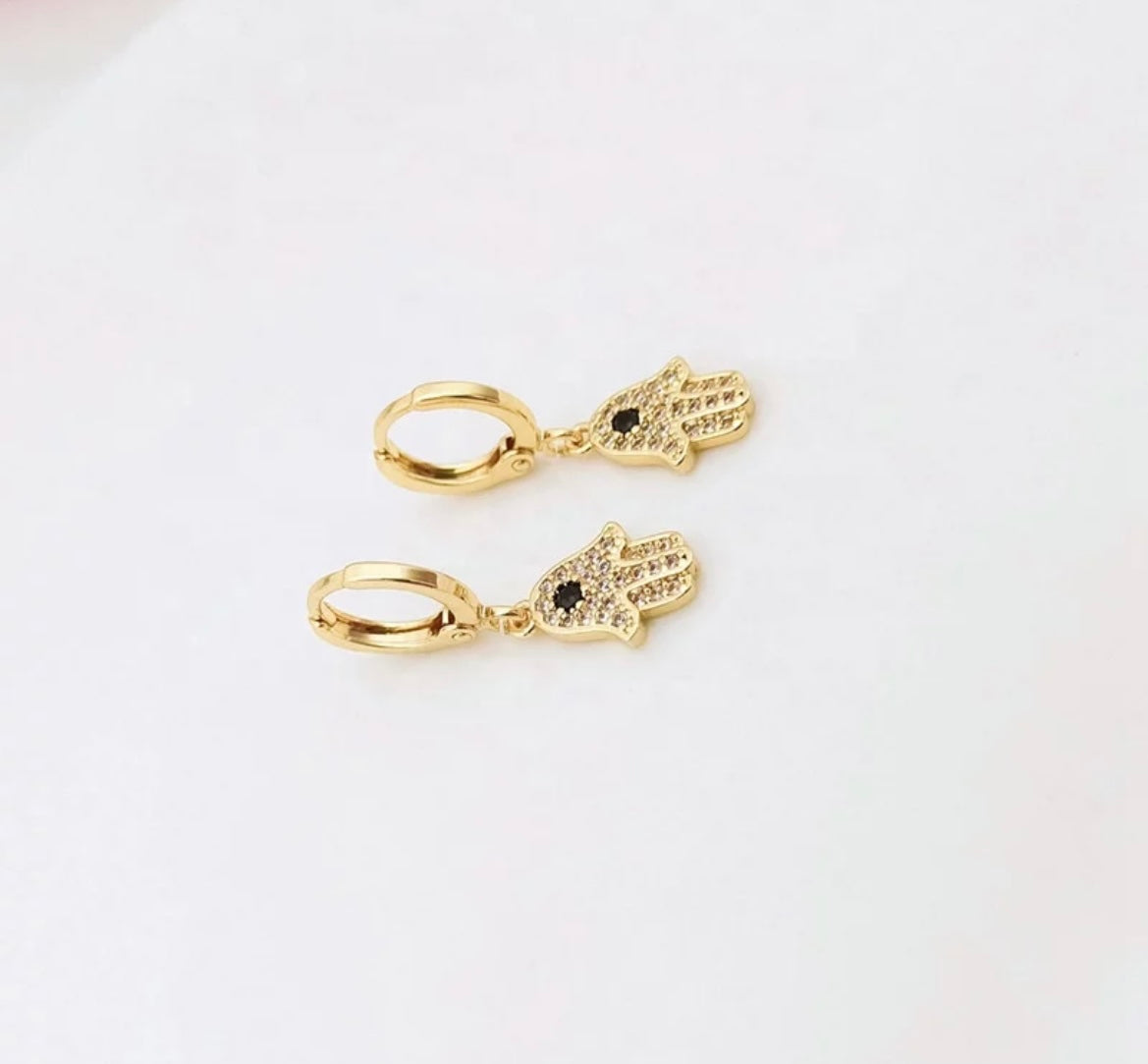 Hamsa gold colored drop earrings