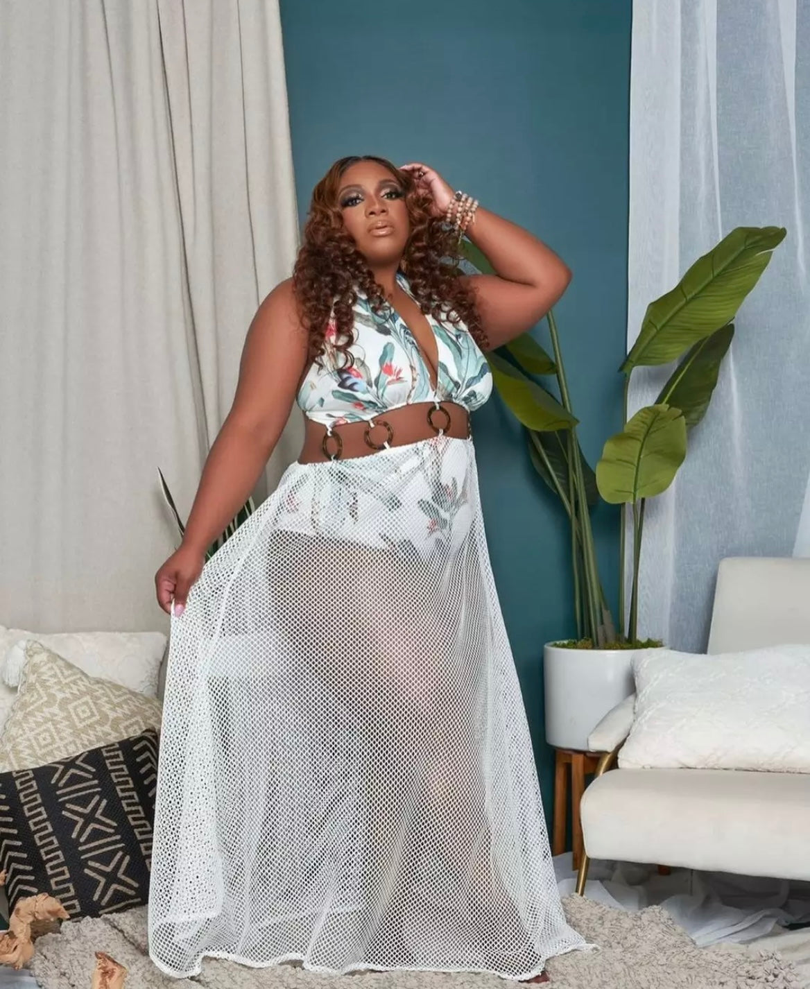 Hawaiian print one piece bathing suit with fishnet skirt