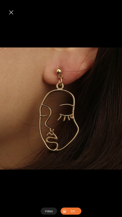 Face silhouette earrings